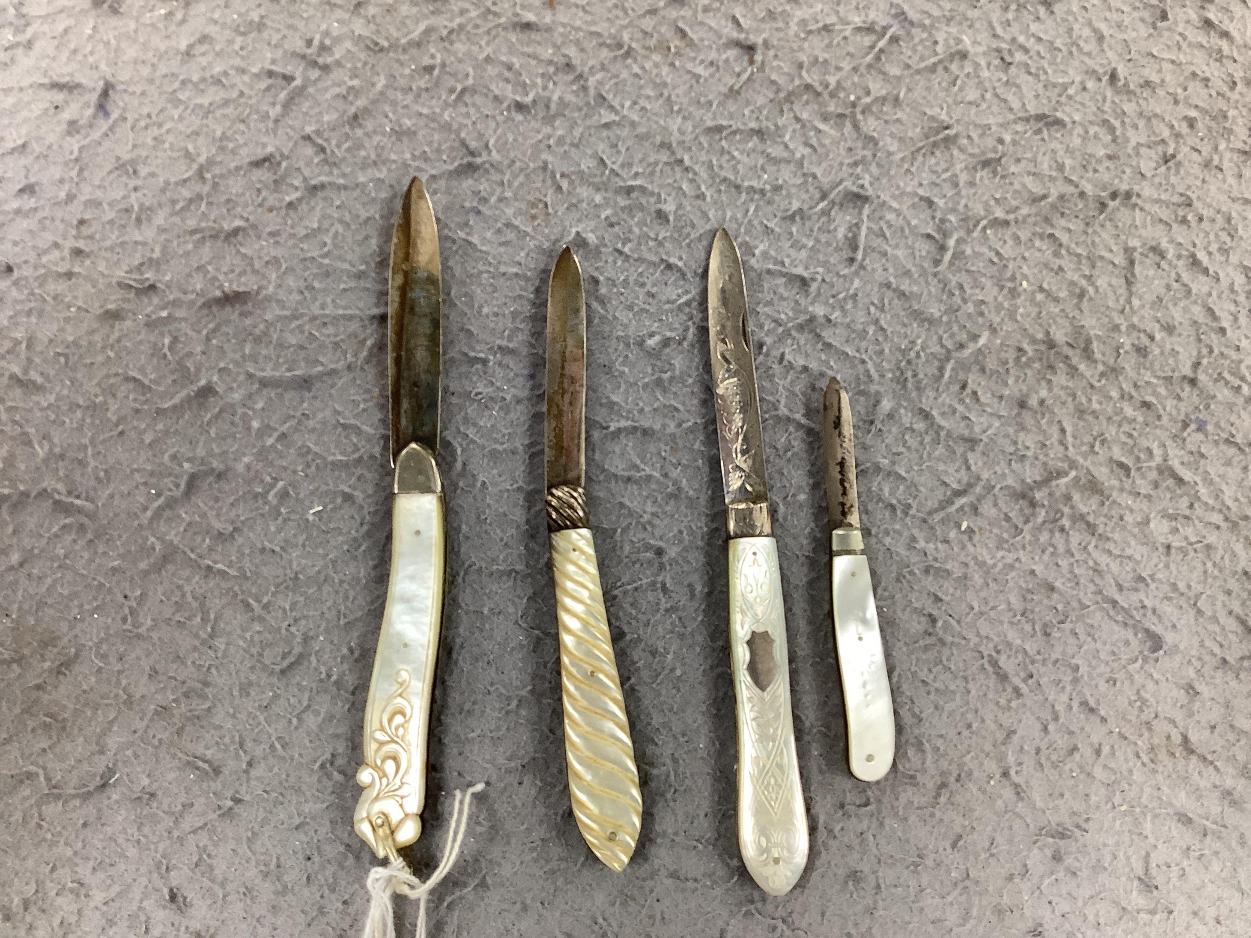 Four assorted Victorian silver and mother of pearl fruit knives, largest Francis Clark, Birmingham, 1843, 90mm. Condition - fair.